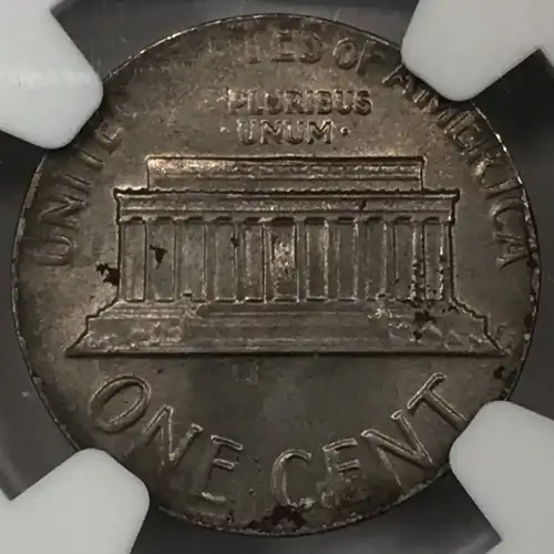 1977 STRUCK ON 10C BLANK (2.3g)